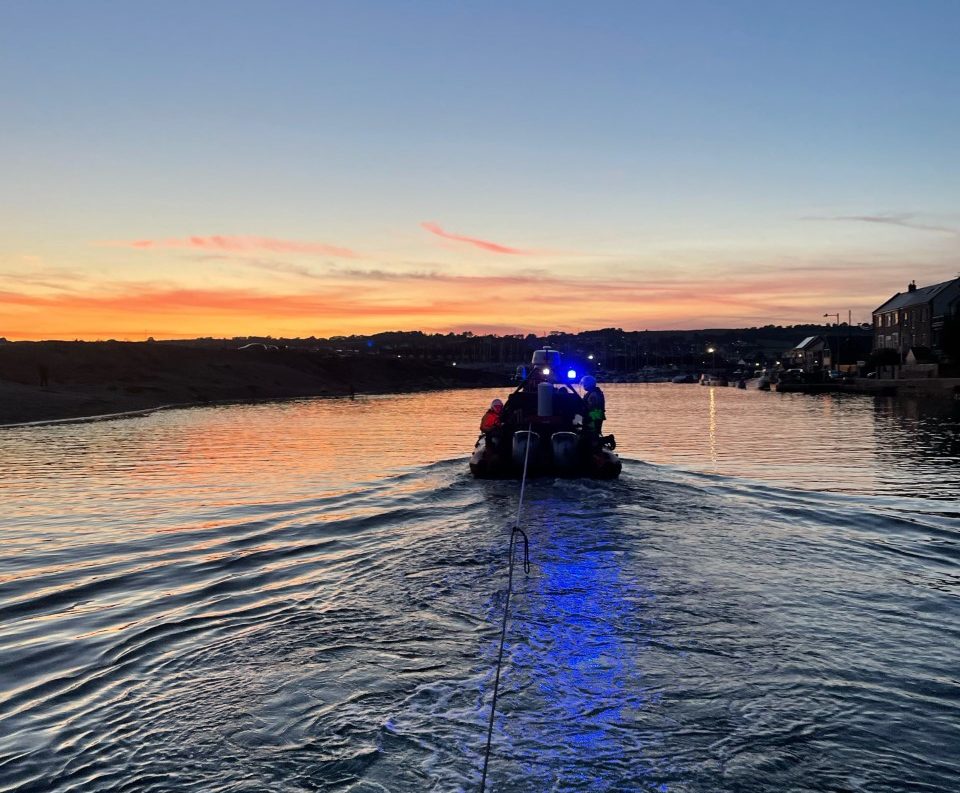 Sidmouth Lifeboat tows a stricken boat to safety